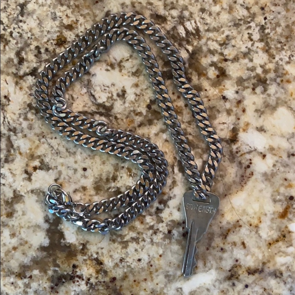 The giving key silver strength necklace